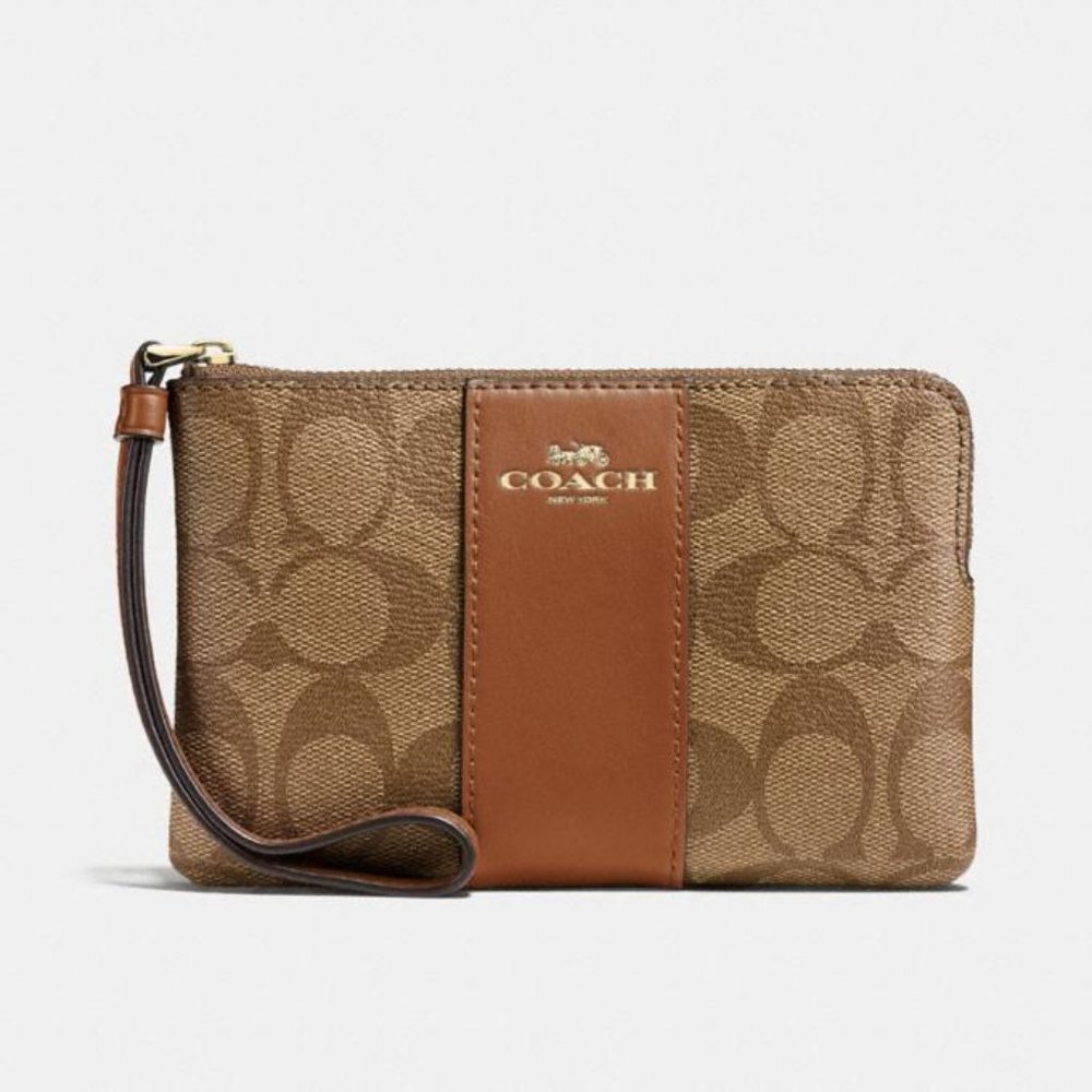 COACH Corner Zip Wristlet in Signature Canvas